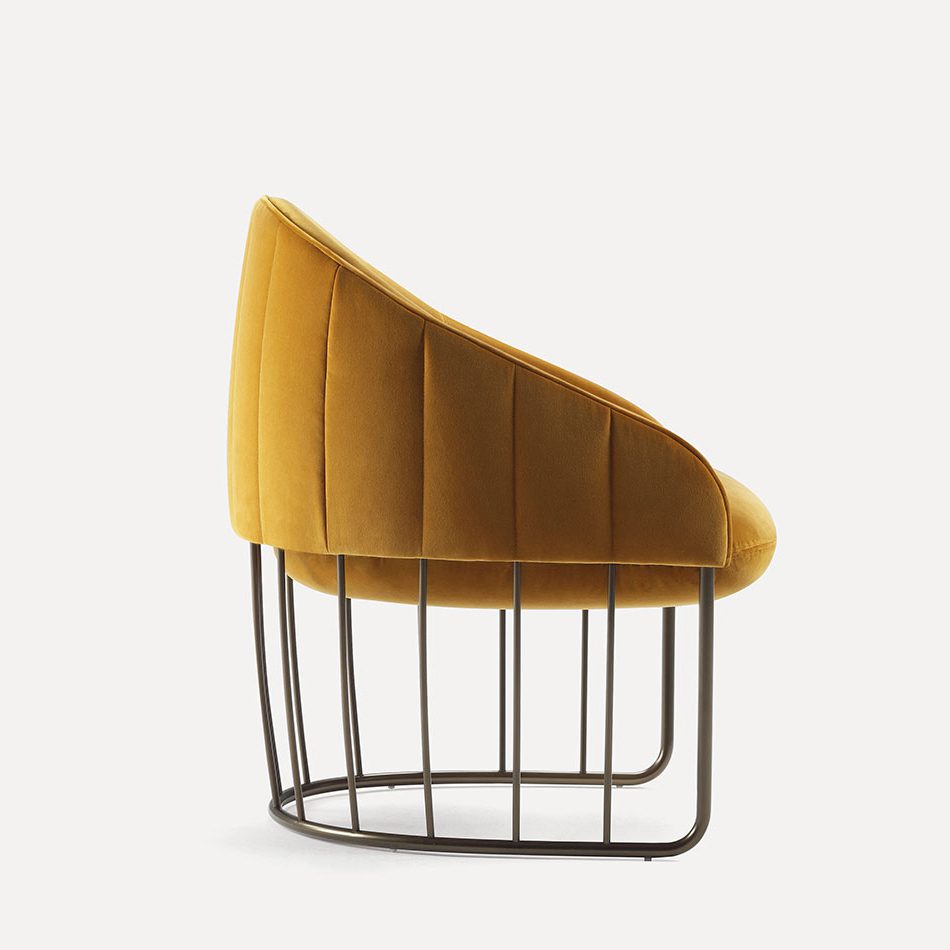 Tonella armchair with distinctive cage base Tonella armchair with distinctive cage base
